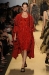 A model walks the runway at the Michael Kors Spring 2012 fashion show during Mercedes-Benz Fashion Week at The Theater at Lincoln Center on September 14, 2011 in New York City.