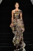 A model walks the runway at the Naeem Khan Spring 2012 fashion show during Mercedes-Benz Fashion Week at The Stage at Lincoln Center on September 15, 2011 in New York City.